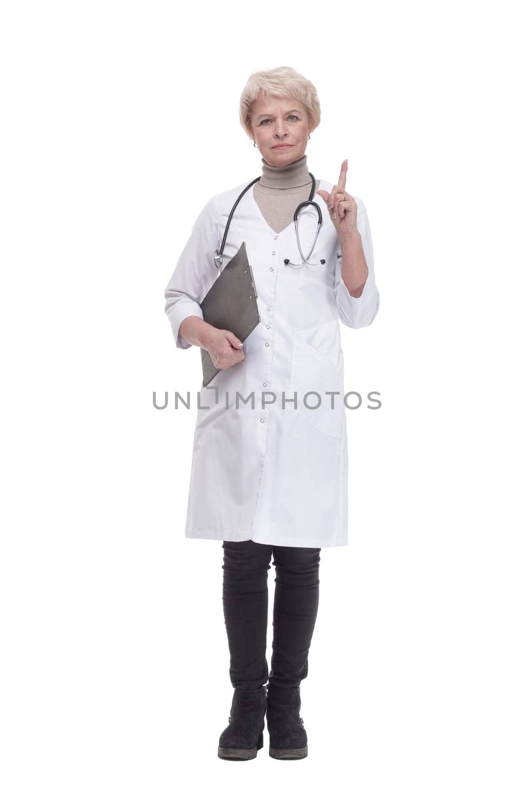 in full growth. responsible female doctor with clipboard . isolated on a white background.