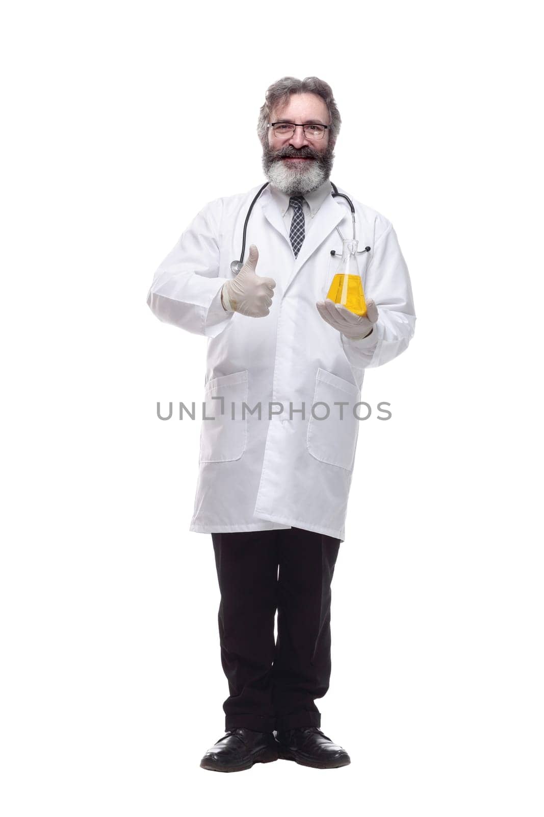in full growth. smiling doctor with a laboratory flask . isolated on a white background