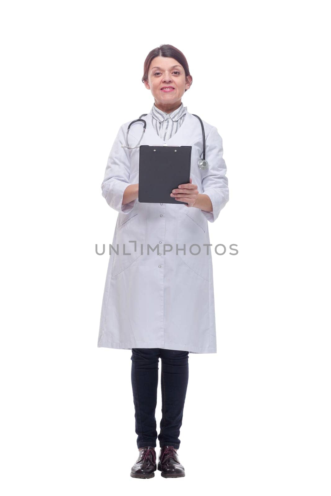 Happy doctor with stethoscope writing on clipboard by asdf