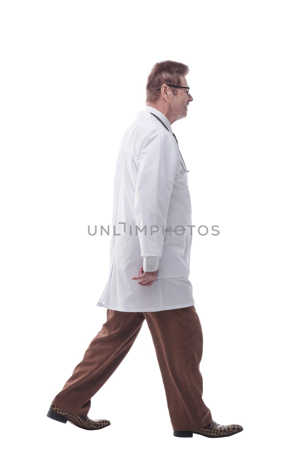 in full growth. a confident therapist, stepping forward. isolated on a white background