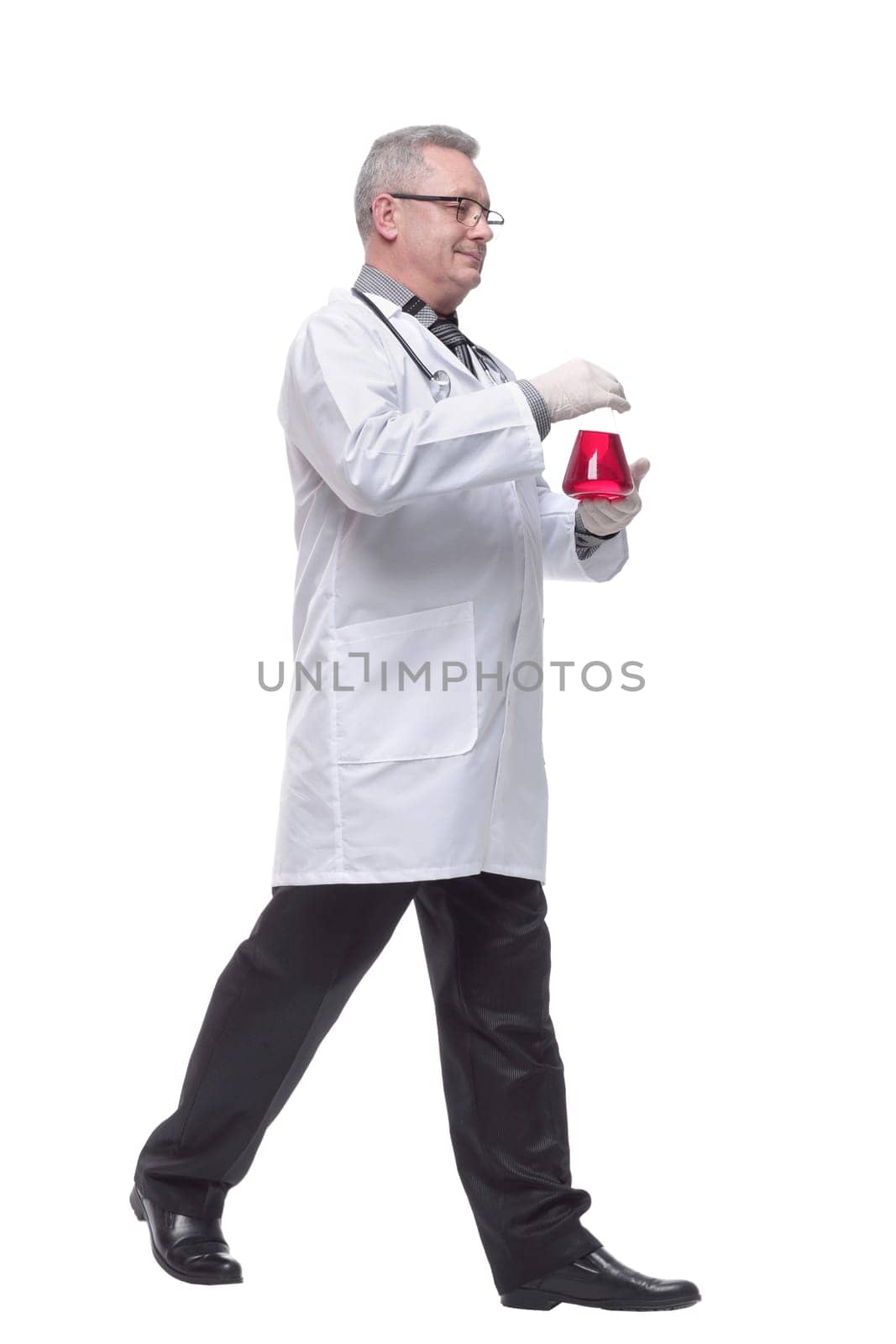 Doctor, the man shows an liquid. Consept of medic, beaker, biology, chemistry, control, workwear. Isolate on a white background by asdf