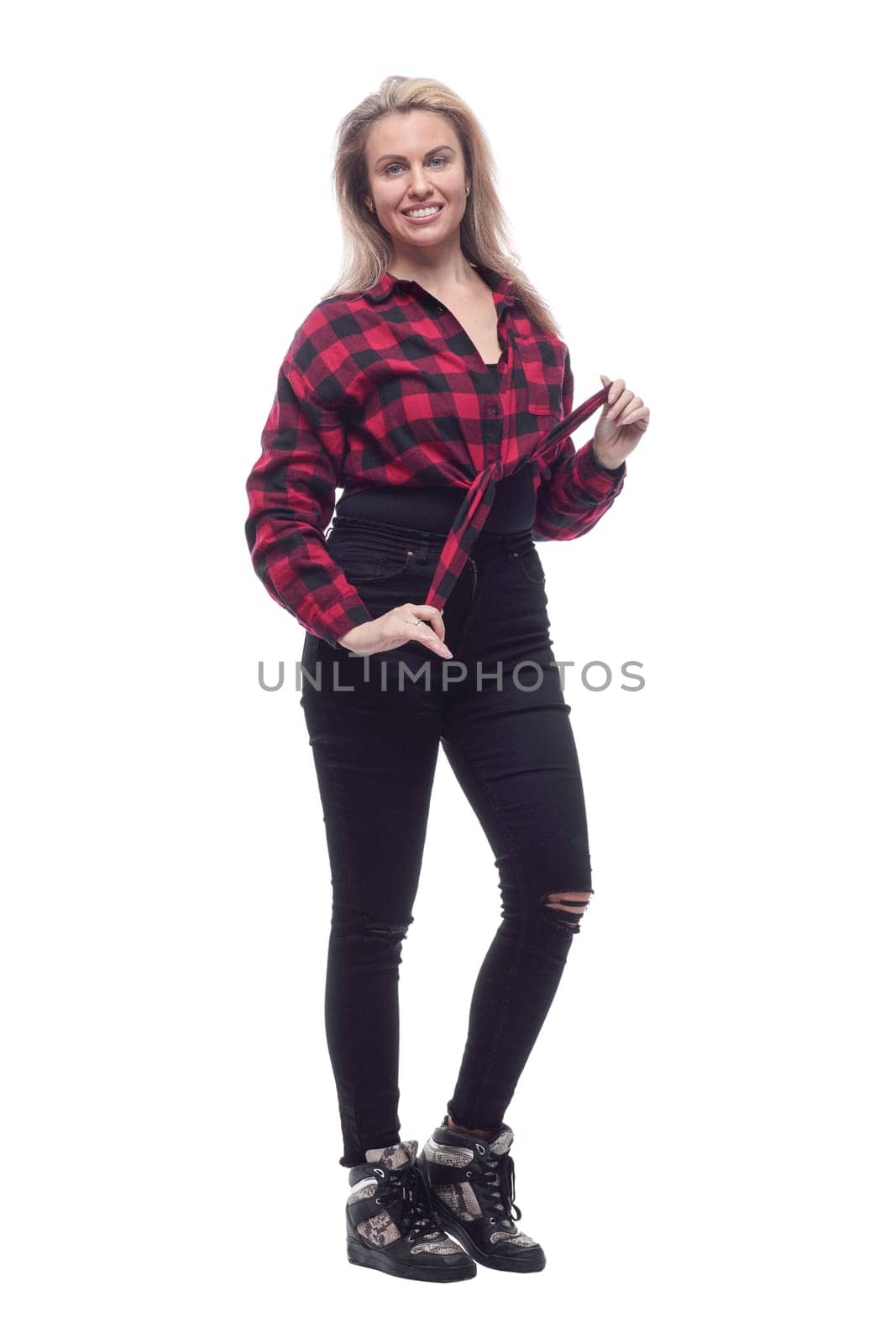 portrait of a pretty young woman in a checked shirt. isolated on a white background.