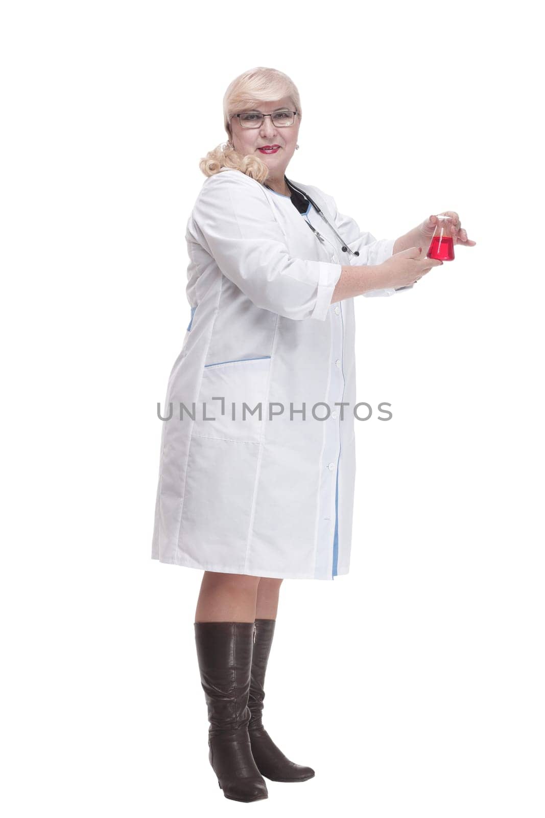 in full growth. attending doctor with a laboratory flask. isolated on a white background.