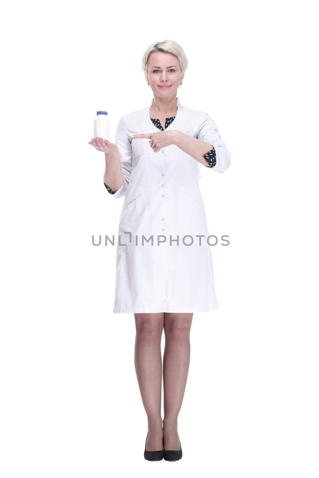in full growth. female doctor holds a bottle of sanitizer. isolated on a white background.