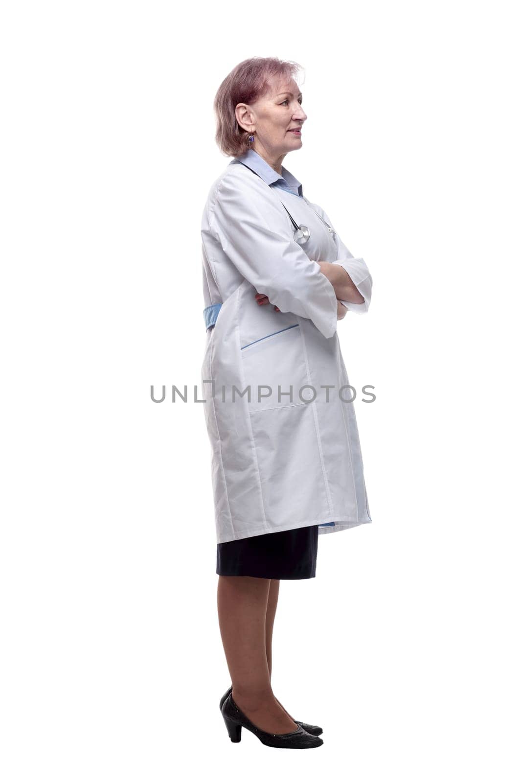 side view. female doctor looking at a white screen . isolated on a white