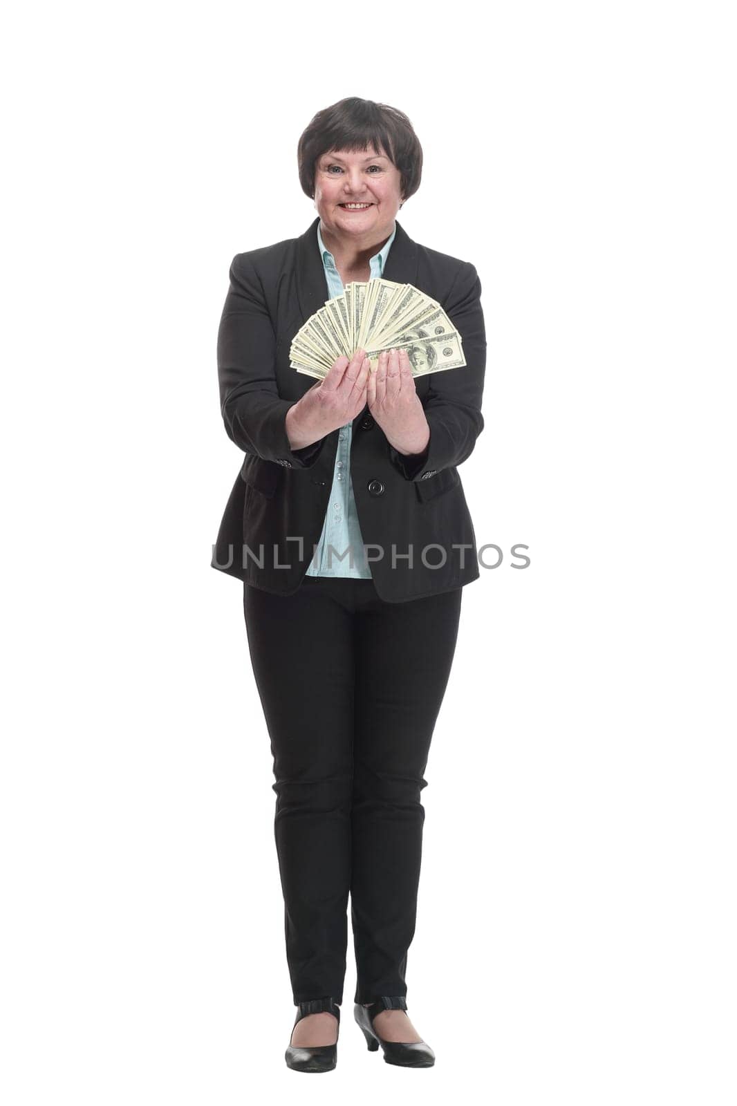 Mature business woman with a bundle of banknotes by asdf