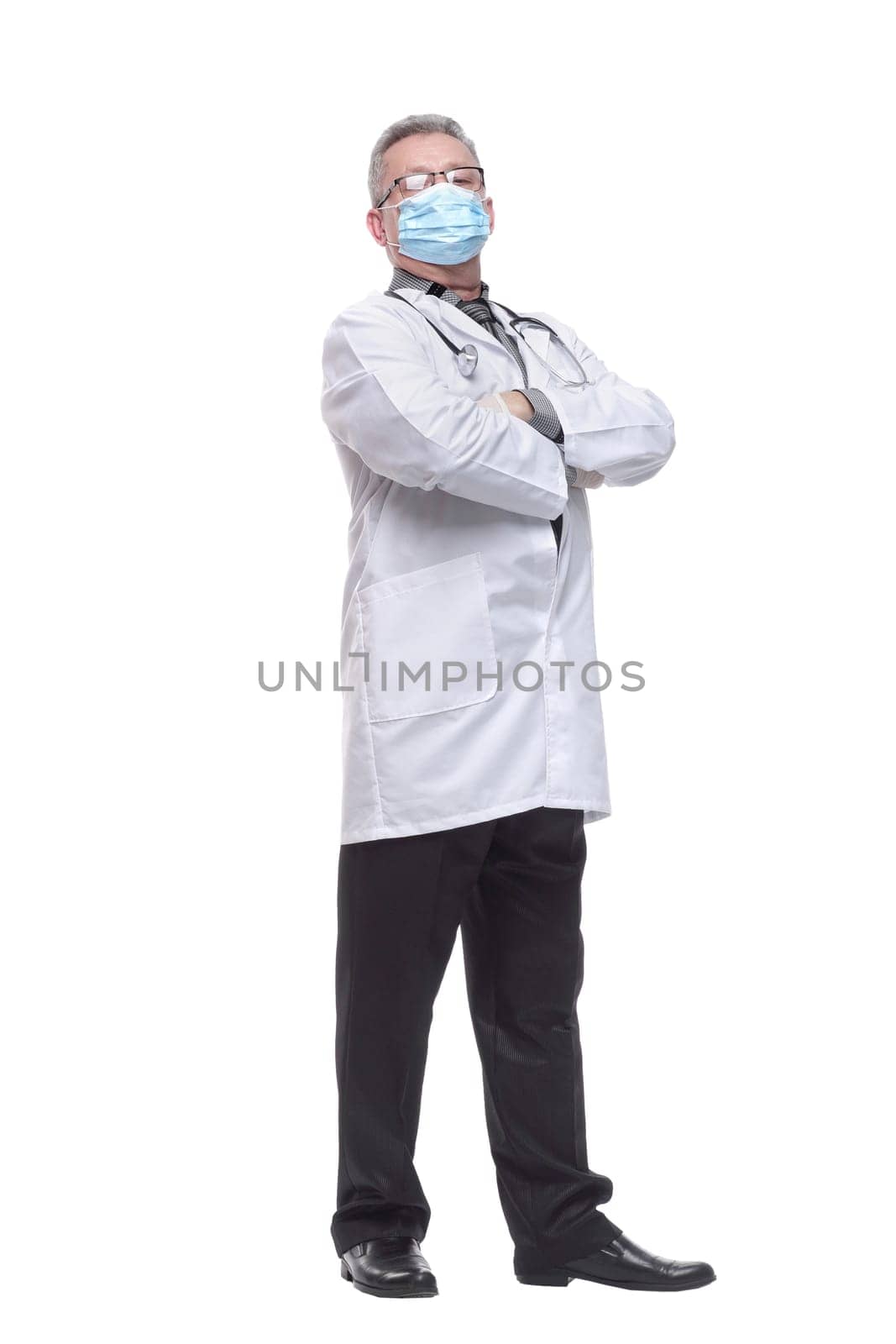Side view of doctor wearing protection face mask by asdf