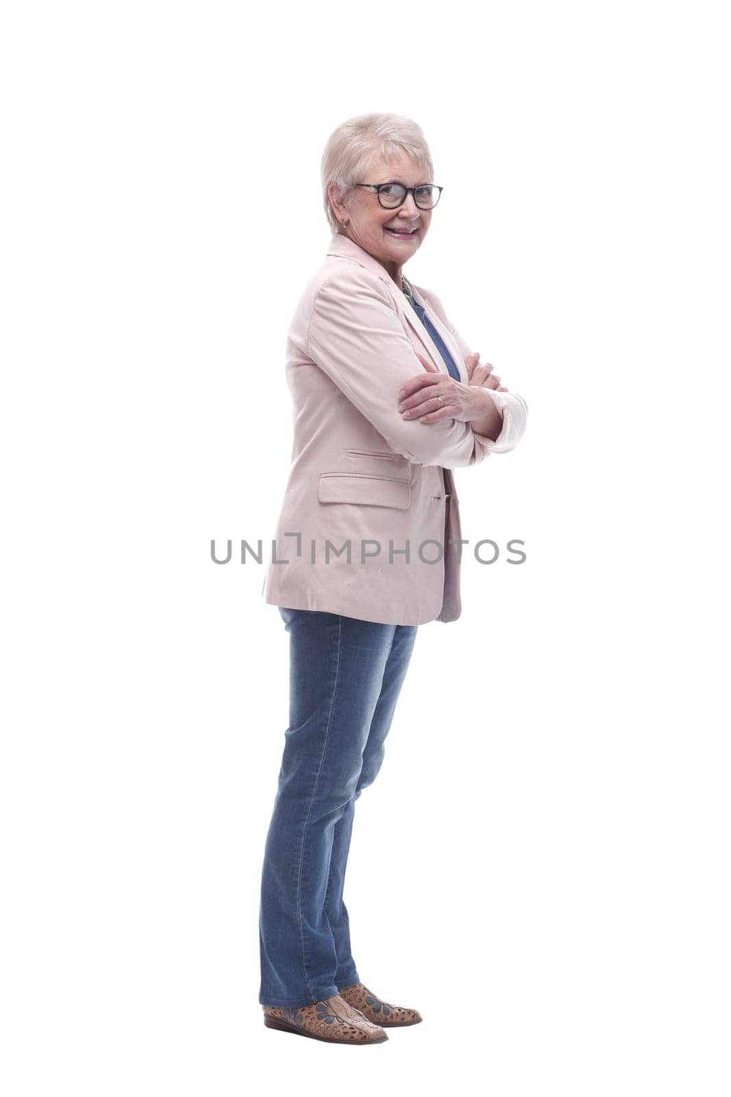 side view. modern elderly woman looking forward . isolated on a white background