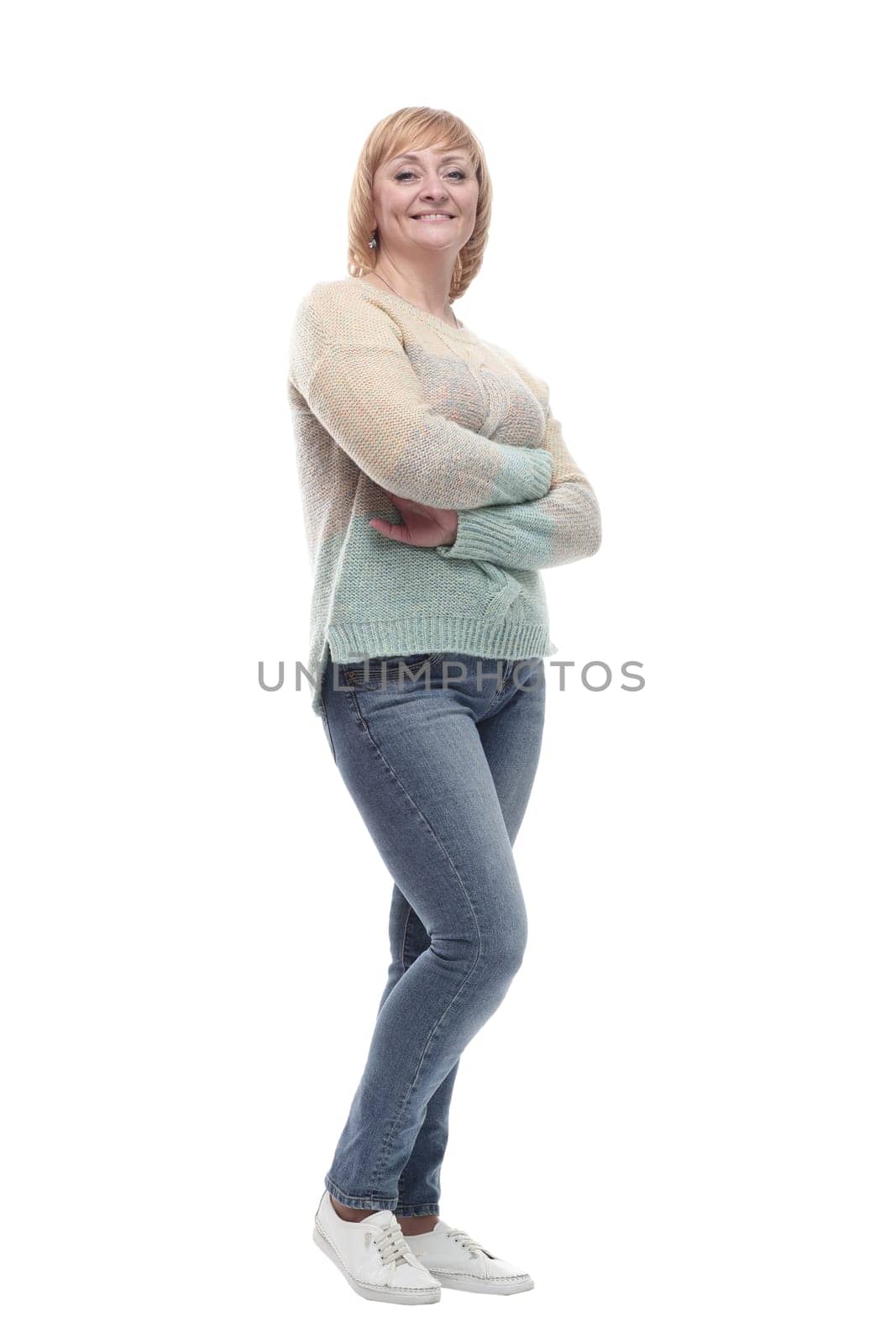 casual smiling woman in jeans and a white jumper. by asdf