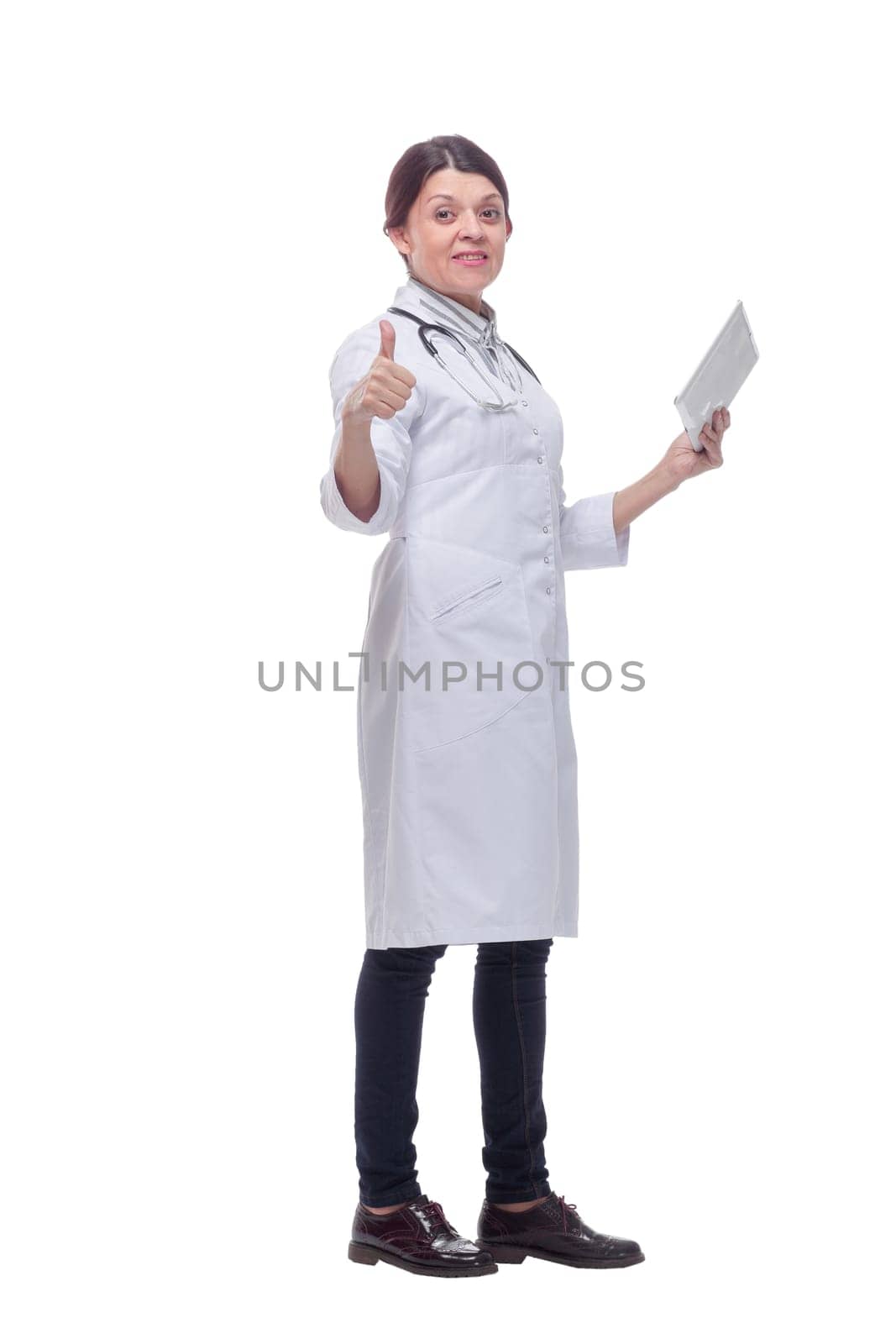 Smiling female doctor or nurse with tablet pc computer showing thumbs up by asdf