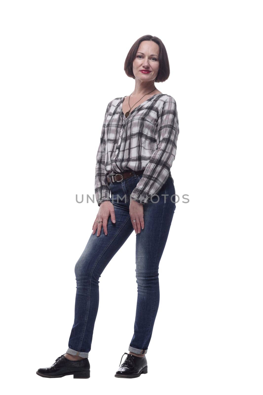 in full growth. attractive mature woman looking at the camera. isolated on a white background.