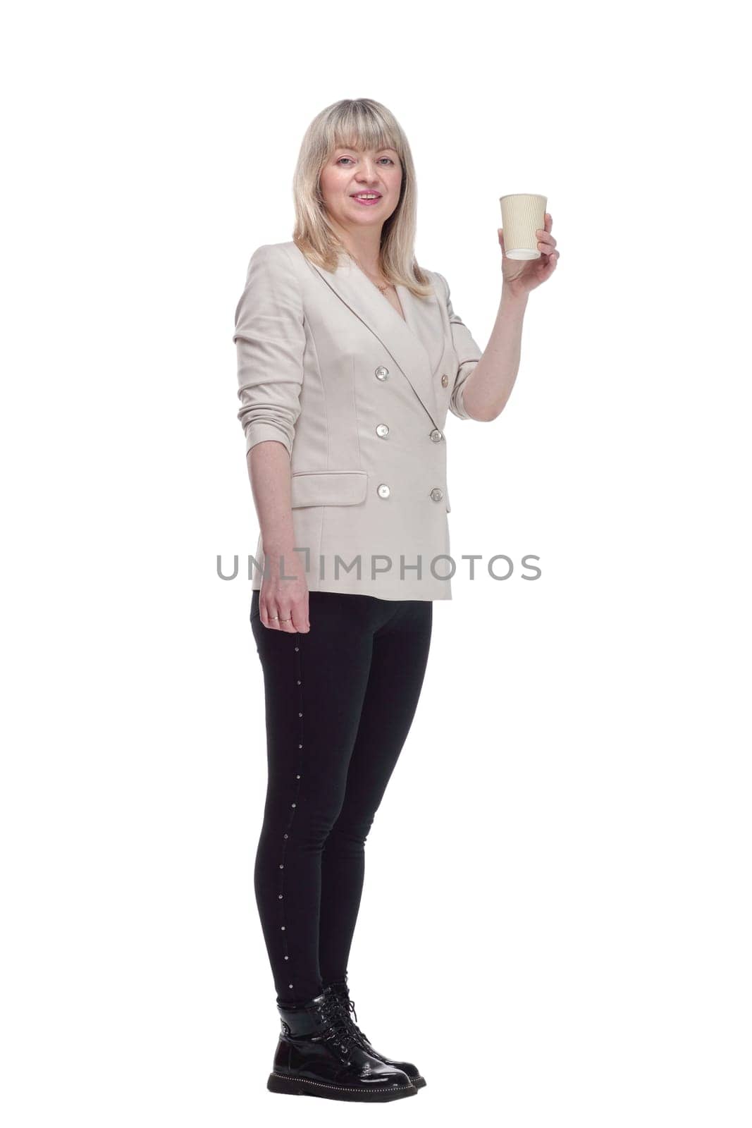 full-length. casual adult woman with takeaway coffee . isolated on a white background.