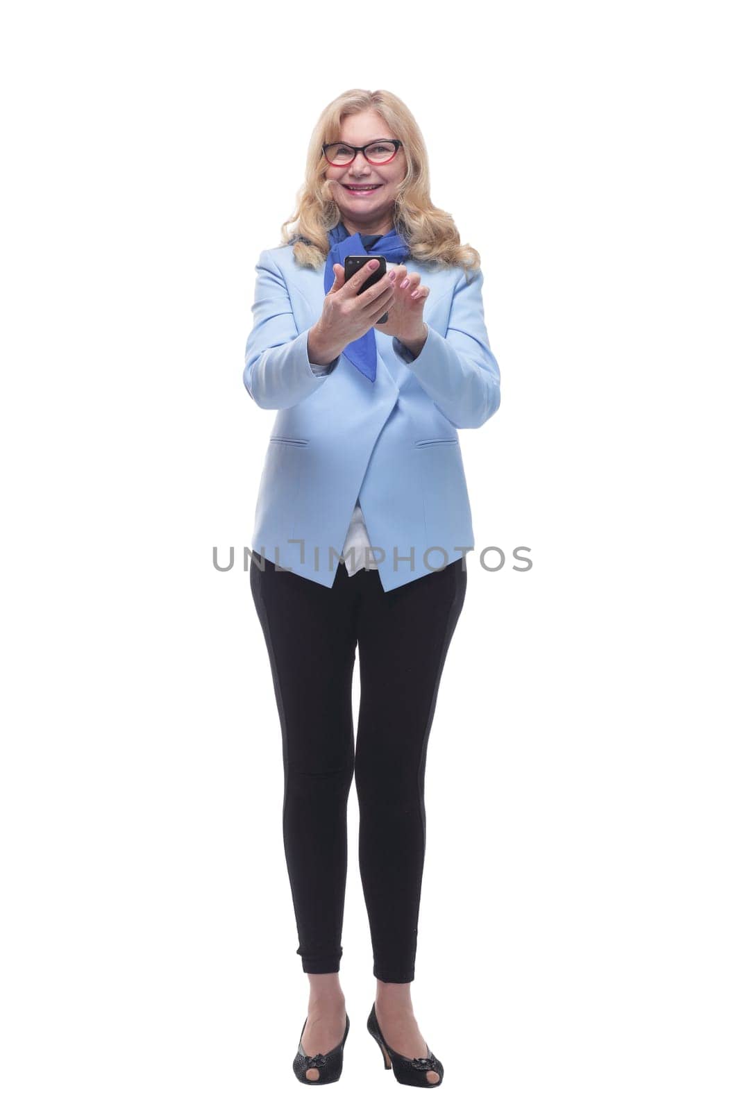 in full growth. smiling adult woman with a smartphone . by asdf