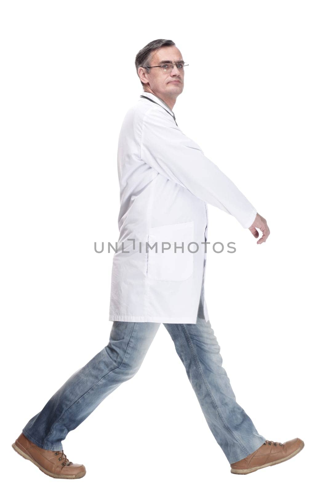 qualified doctor with stethoscope going forward. isolated on a white by asdf