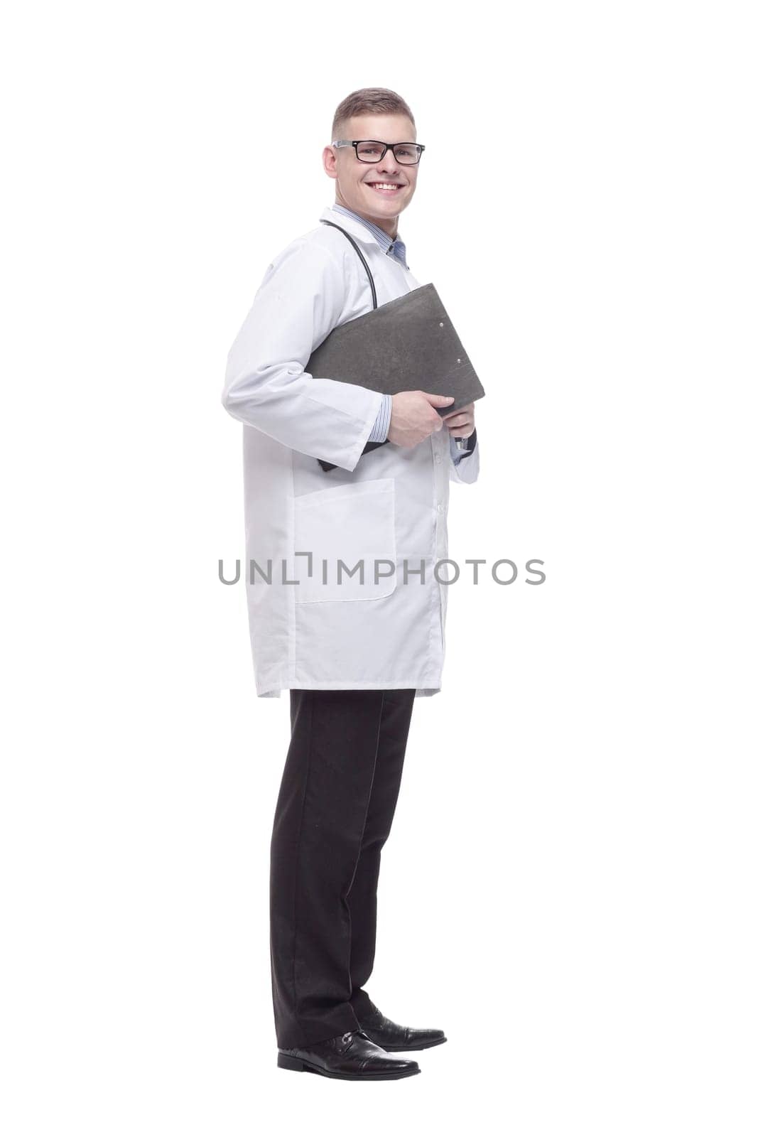 young doctor with a clipboard. isolated on a white by asdf