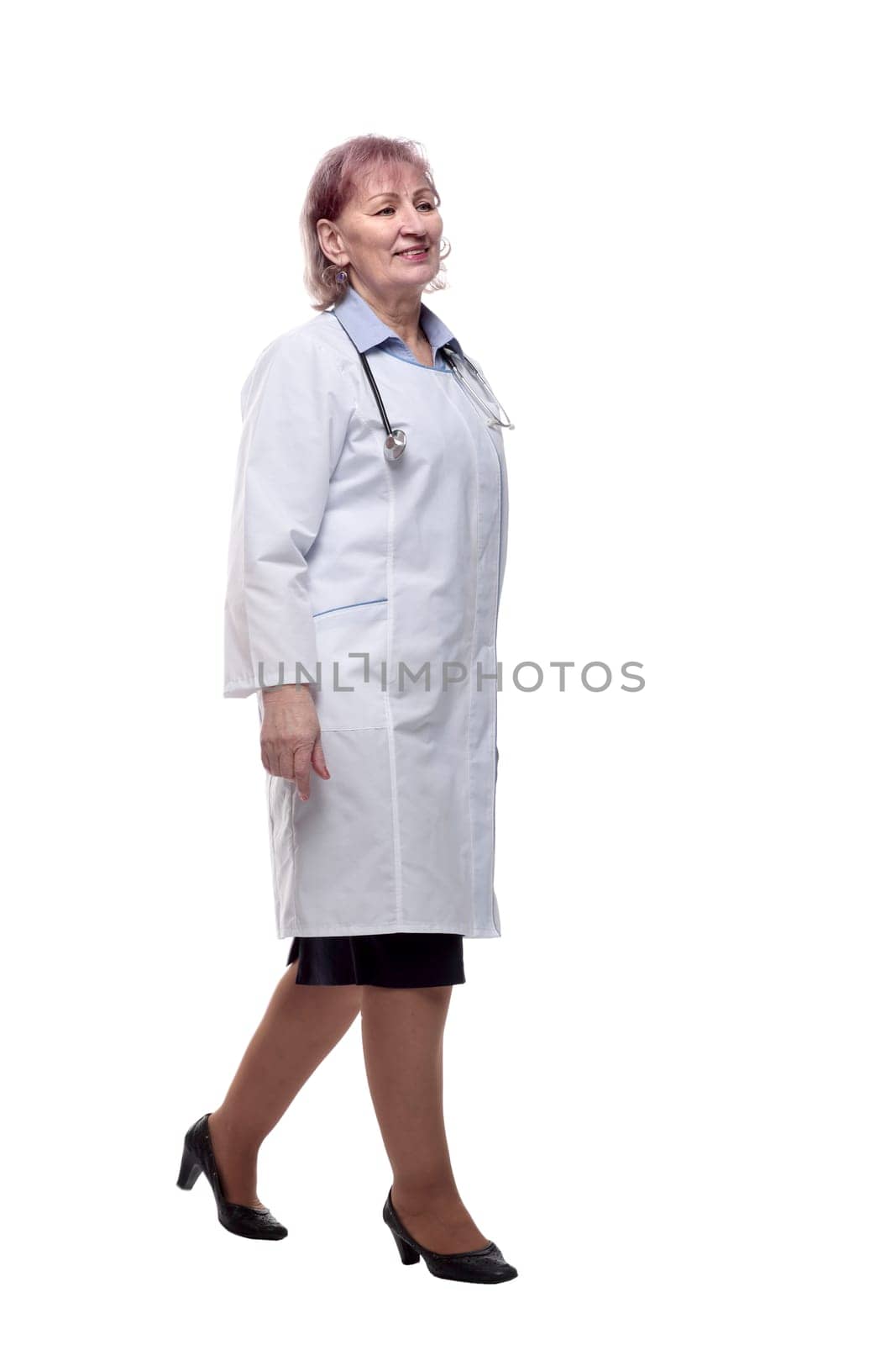 smiling woman doctor striding forward . isolated on a white by asdf