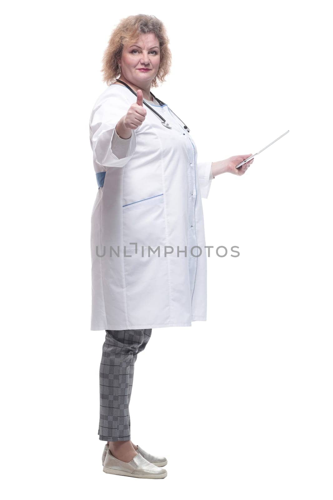 full-length. senior female doctor with a digital tablet. isolated on a white background.
