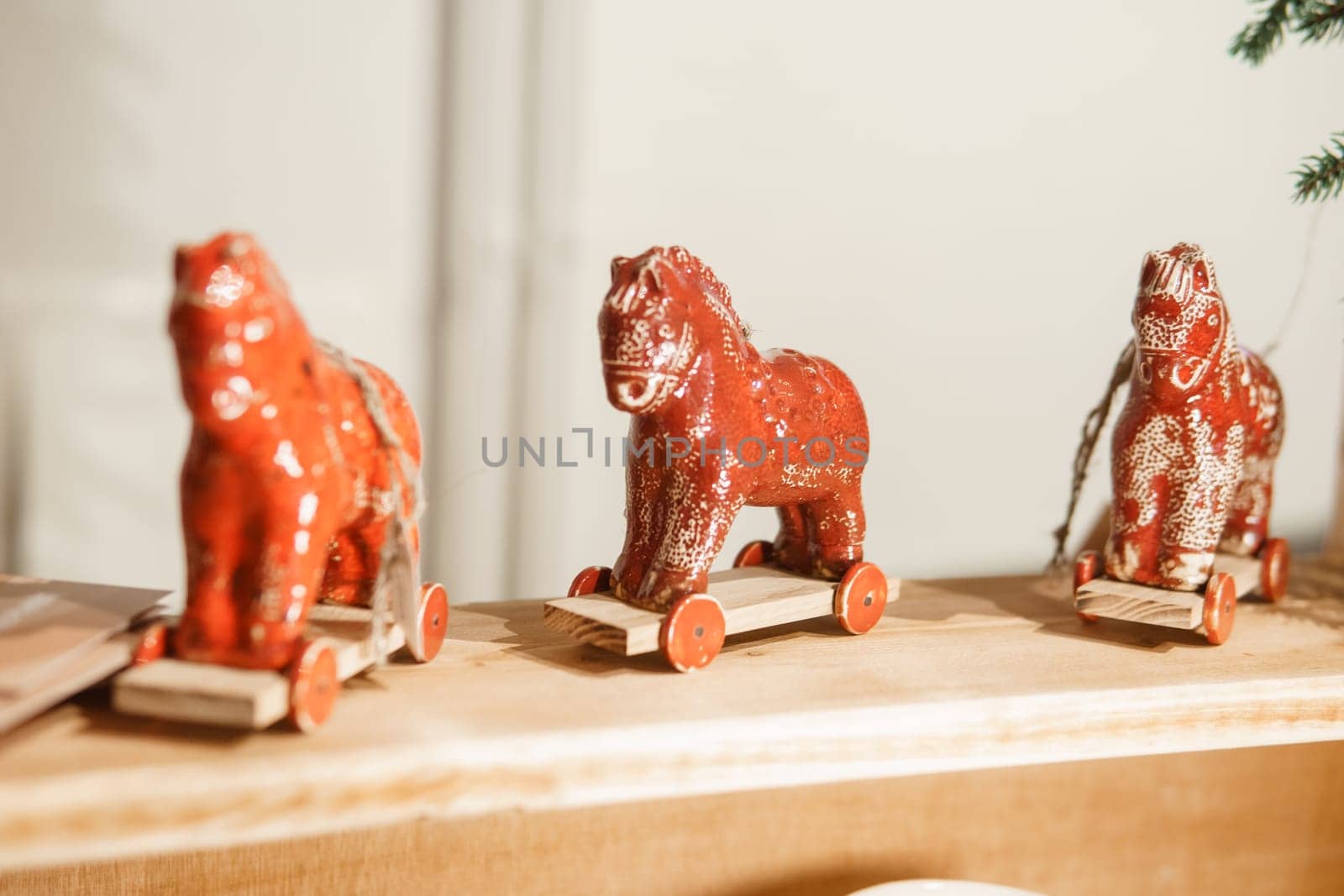 Sale of handmade ceramic Christmas tree toys at the Christmas Fair. Black Friday for the winter holidays