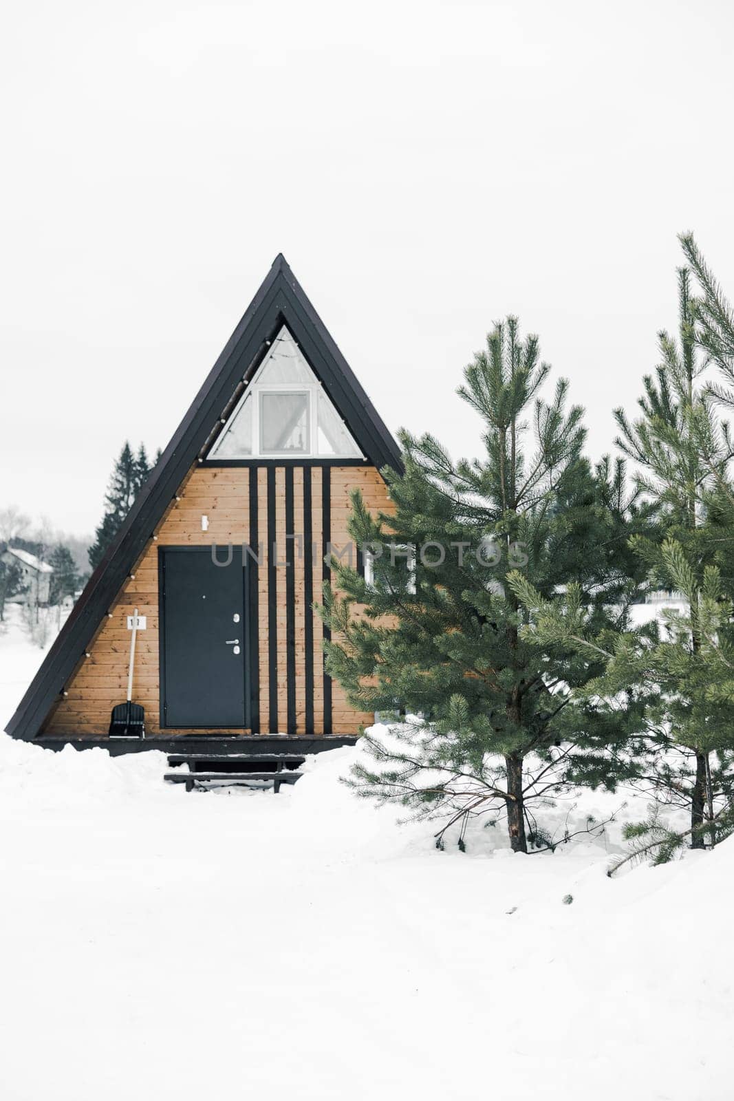 A country house in nature in winter. Rest in an ecologically clean place in winter. Glamping in nature
