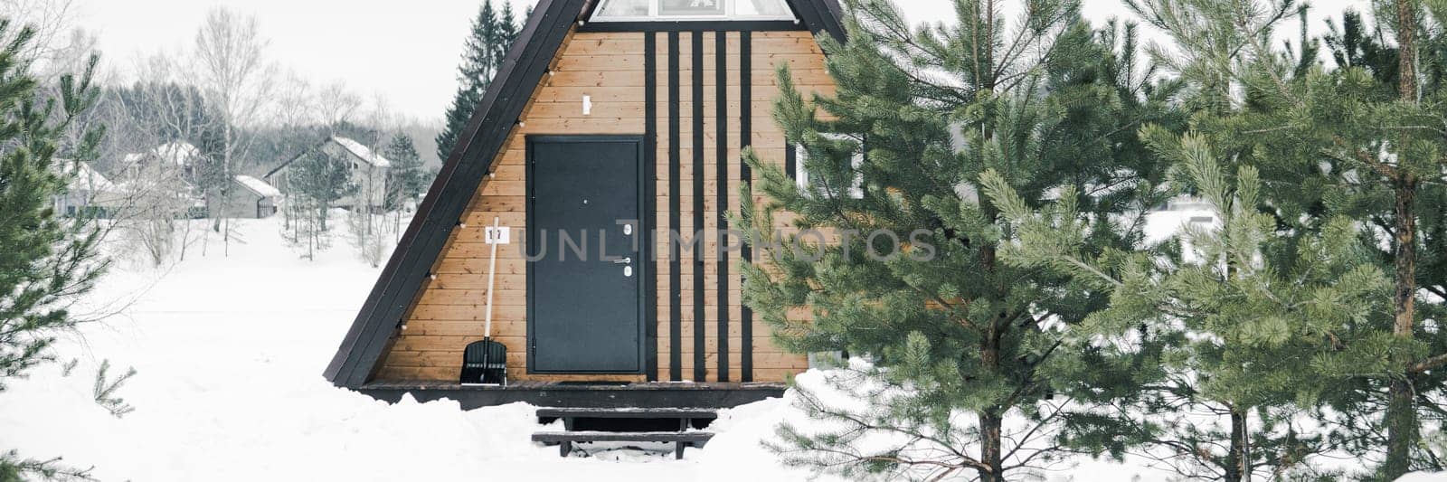 A country house in nature in winter. Rest in an ecologically clean place in winter. Glamping in nature