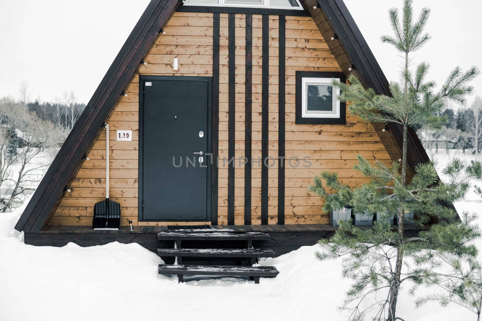 A country house in nature in winter. Rest in an ecologically clean place in winter. Glamping in nature