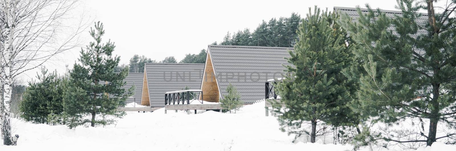 A country house in nature in winter. Rest in an ecologically clean place in winter. Glamping in nature