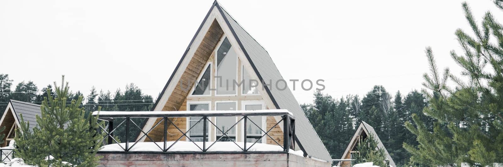 A country house in nature in winter. Rest in an ecologically clean place in winter. Glamping in nature