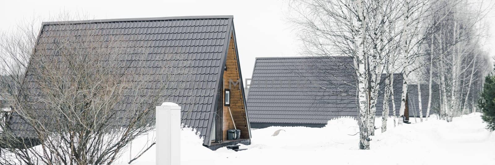 A country house in nature in winter. Rest in an ecologically clean place in winter. Glamping in nature