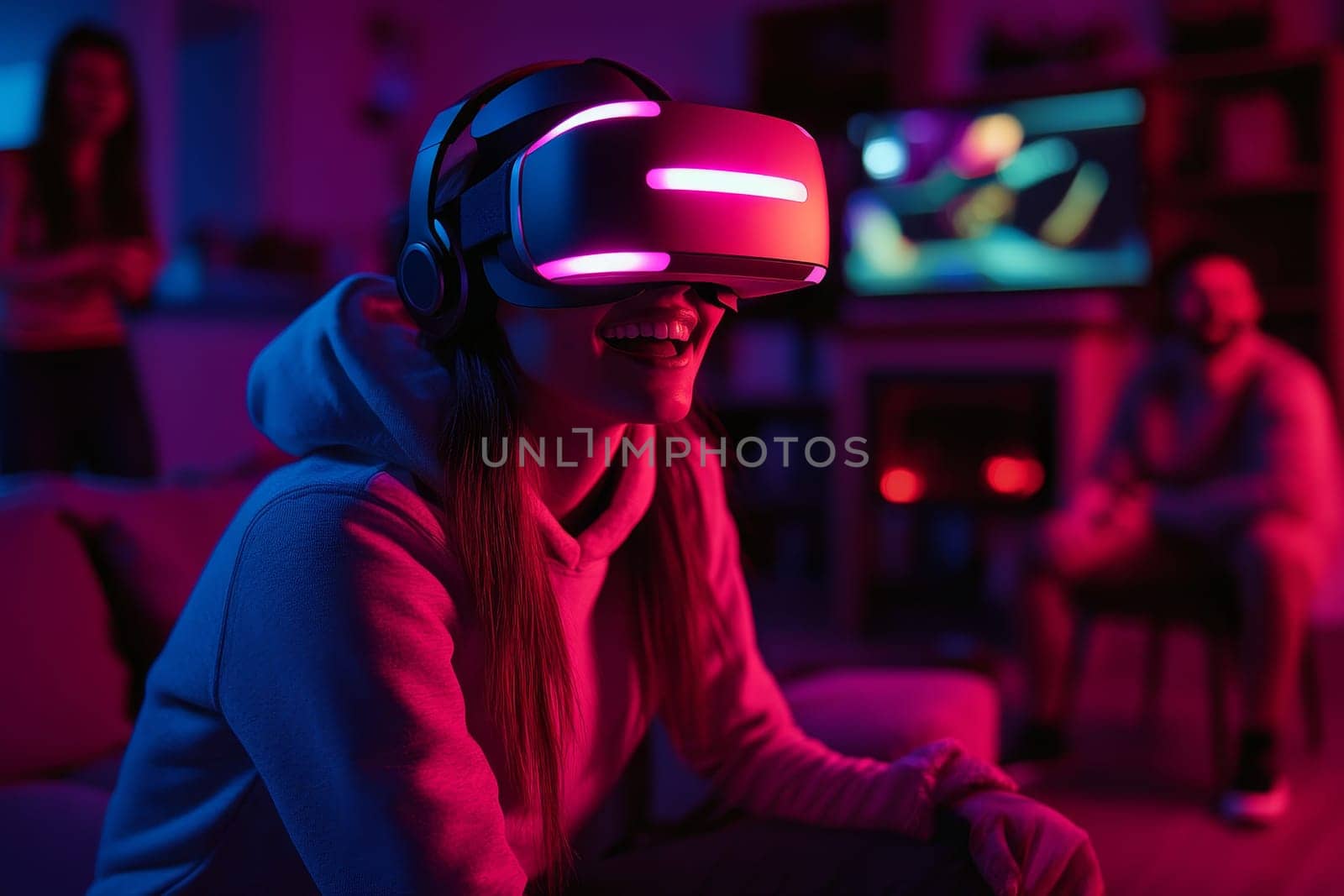 Woman wearing illuminated VR headset playing game in room with vibrant neon lighting and friends.