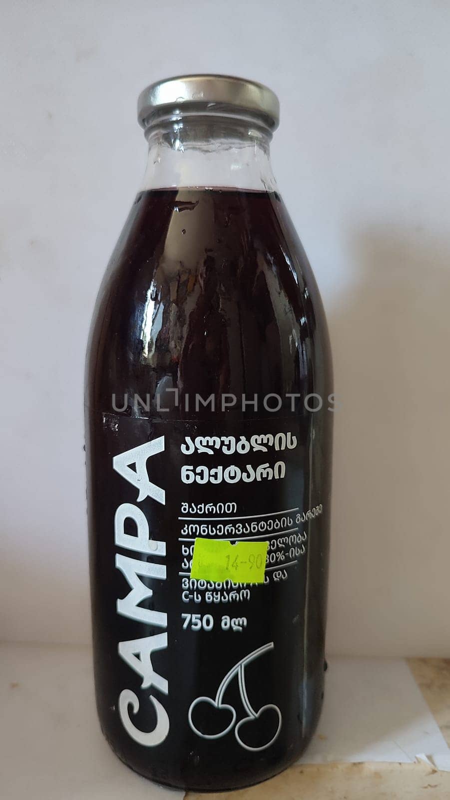 03 July 2024 Beer-Sheva Israel, food stor ,grape juice in glass bottle, drink product. High quality photo