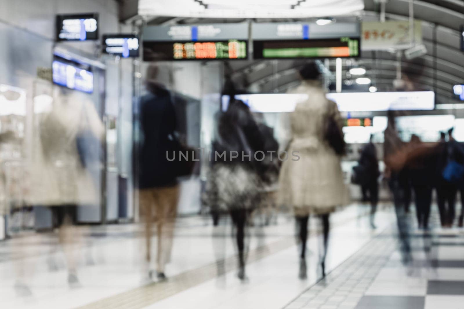 Business people traveling by Tokyo metro. by kasto