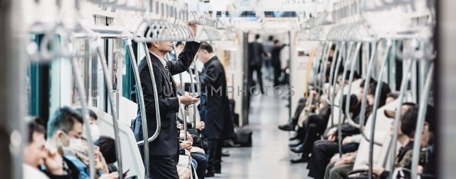 Passengers traveling by Tokyo metro. by kasto