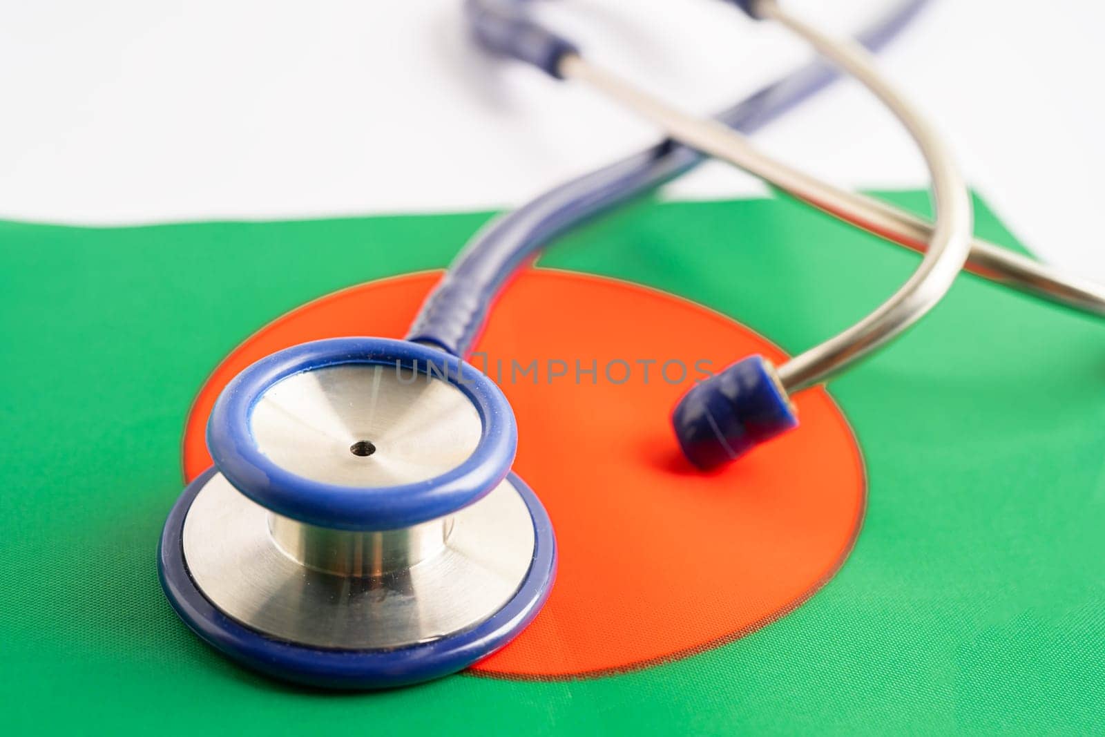 Stethoscope on Bangladesh flag background, Business and finance concept.