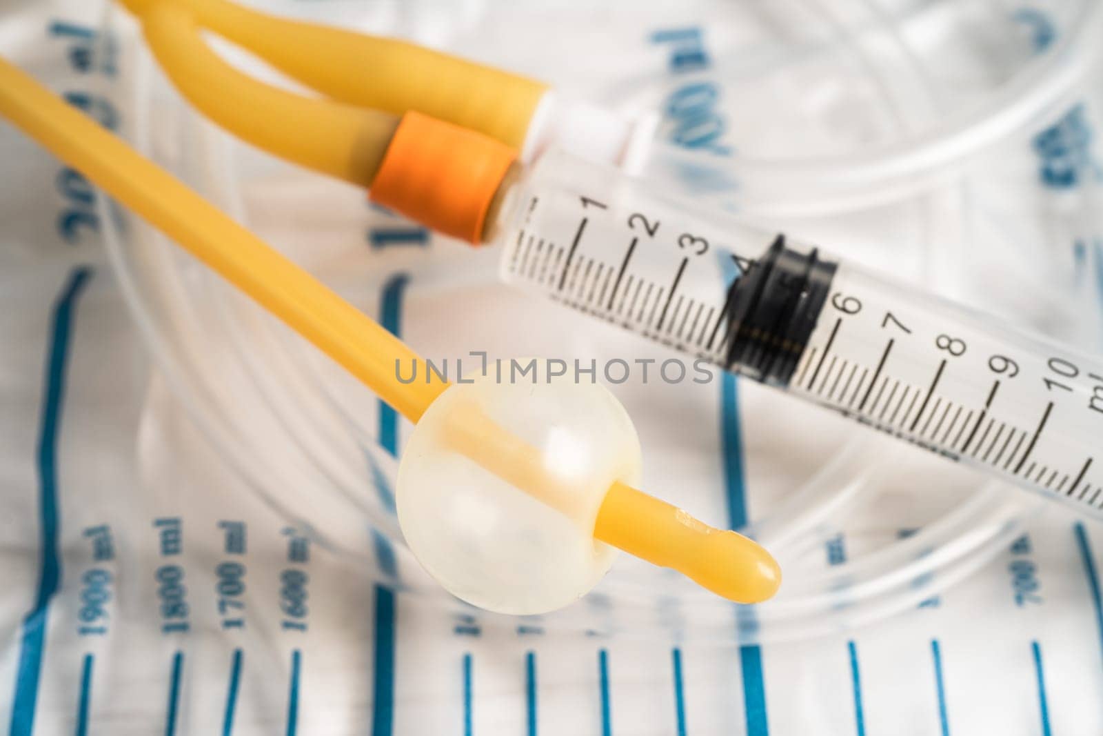 Foley urinary catheter with urine bag for disability or patient in hospital. by pamai