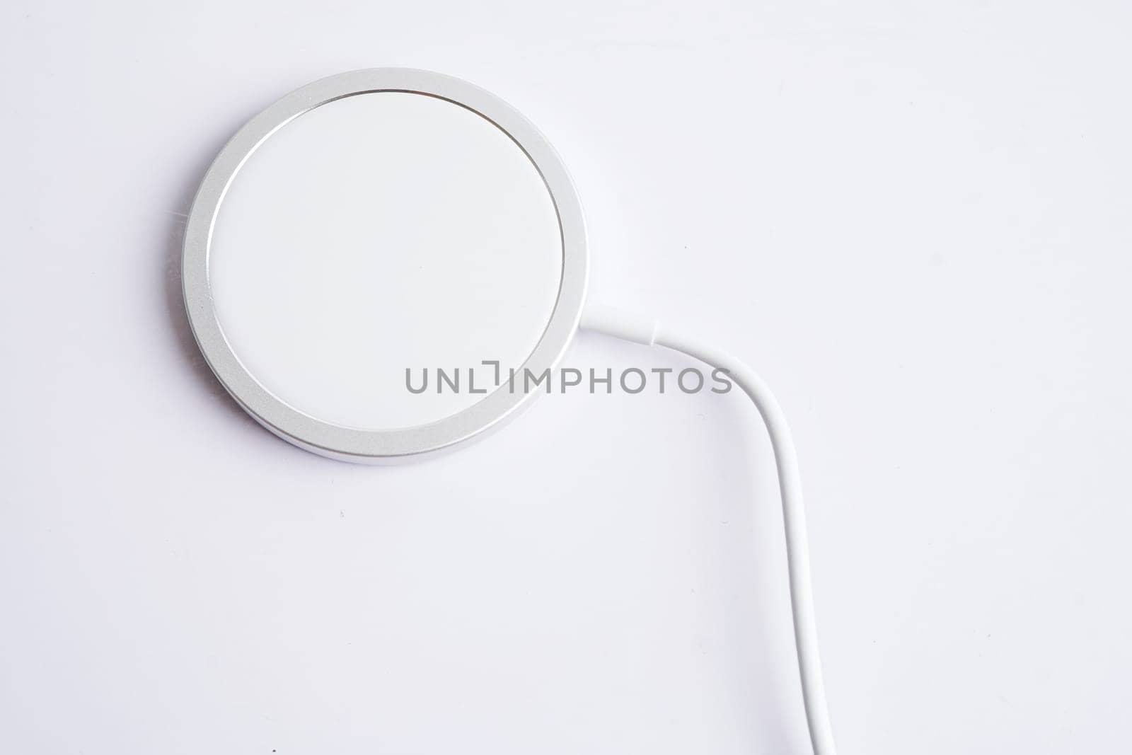 Wireless charger, magnetic charging modern equipment of mobile phone.