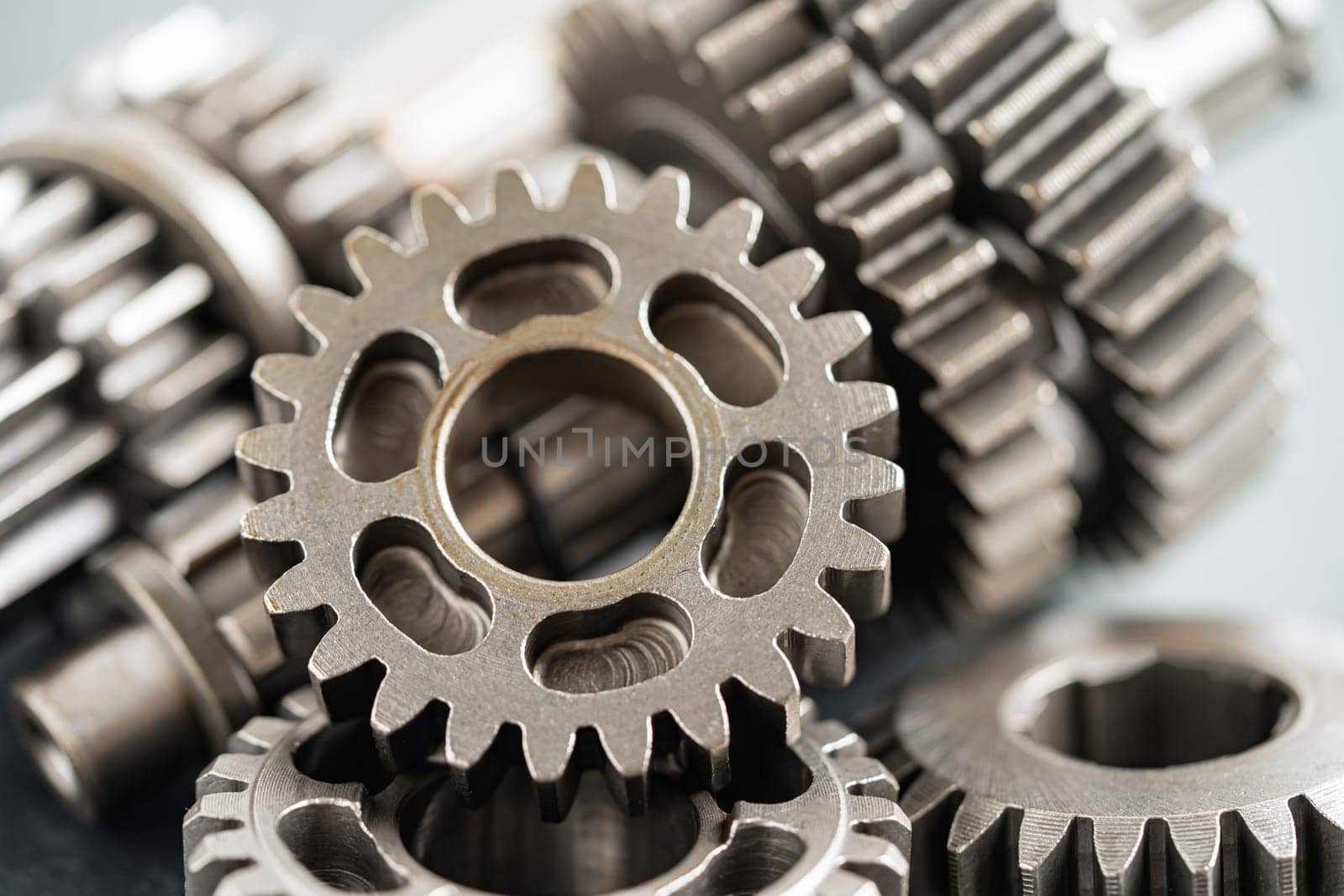 Gear and cogs wheels, clock mechanism, brass metal engine industrial. by pamai