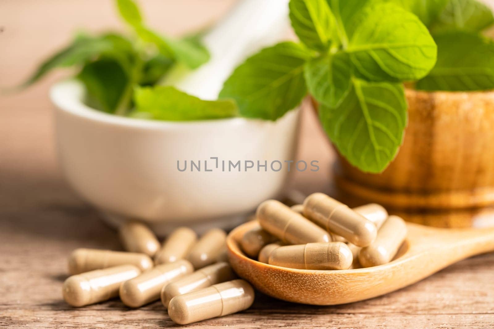 Alternative medicine herbal organic capsule with vitamin E omega 3 fish oil, mineral, drug with herbs leaf natural supplements for healthy good life.