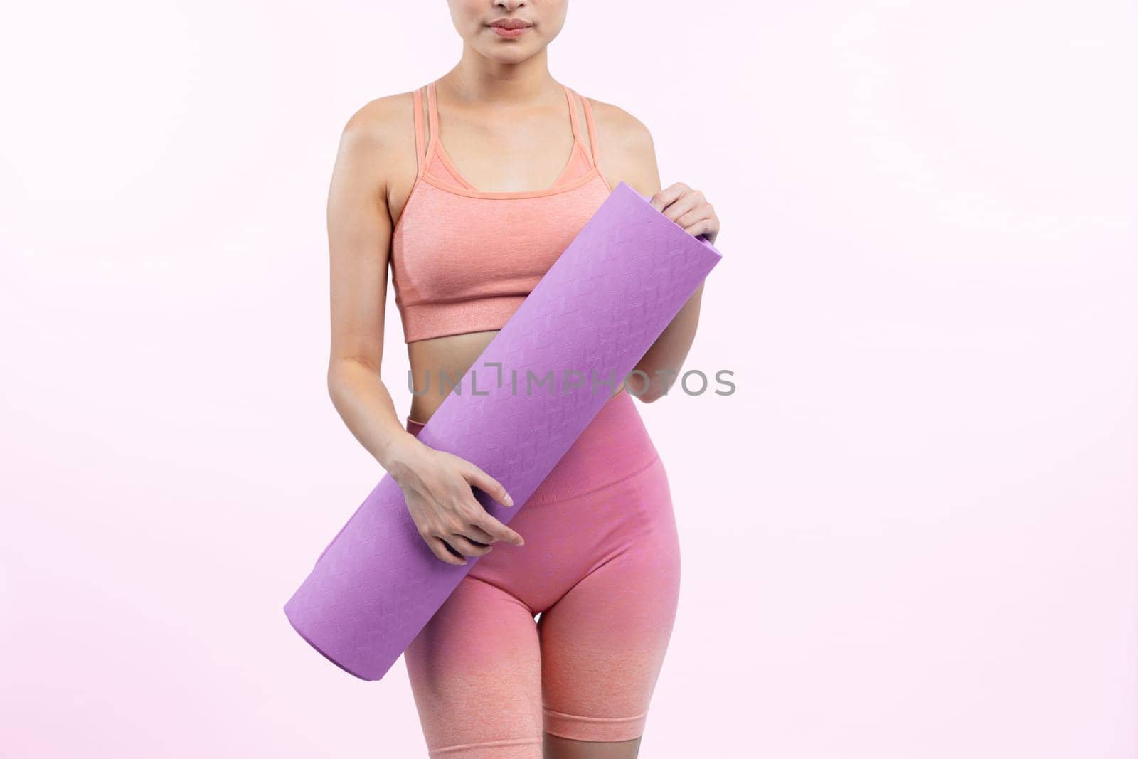 Young attractive asian woman portrait in sportswear with exercising mat Vigorous by biancoblue