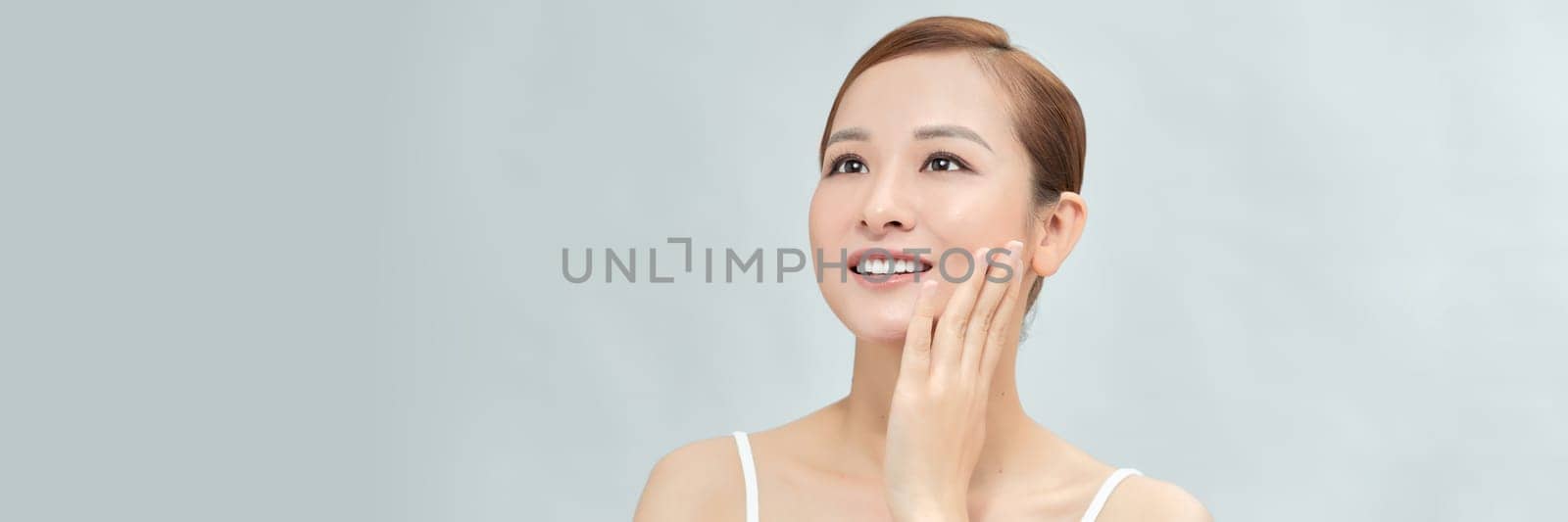 Beauty shot of Beautiful women with clean fresh skin, Asian woman. Web banner by makidotvn