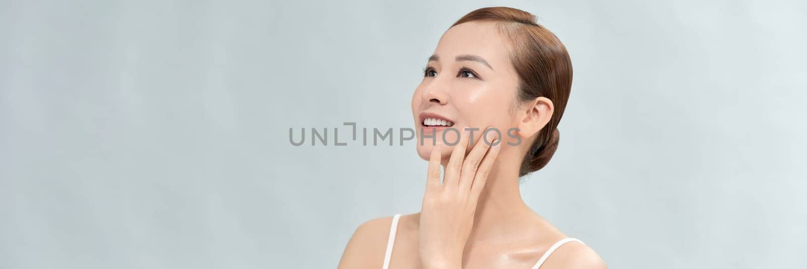 Beauty shot of Beautiful women with clean fresh skin, Asian woman. Web banner