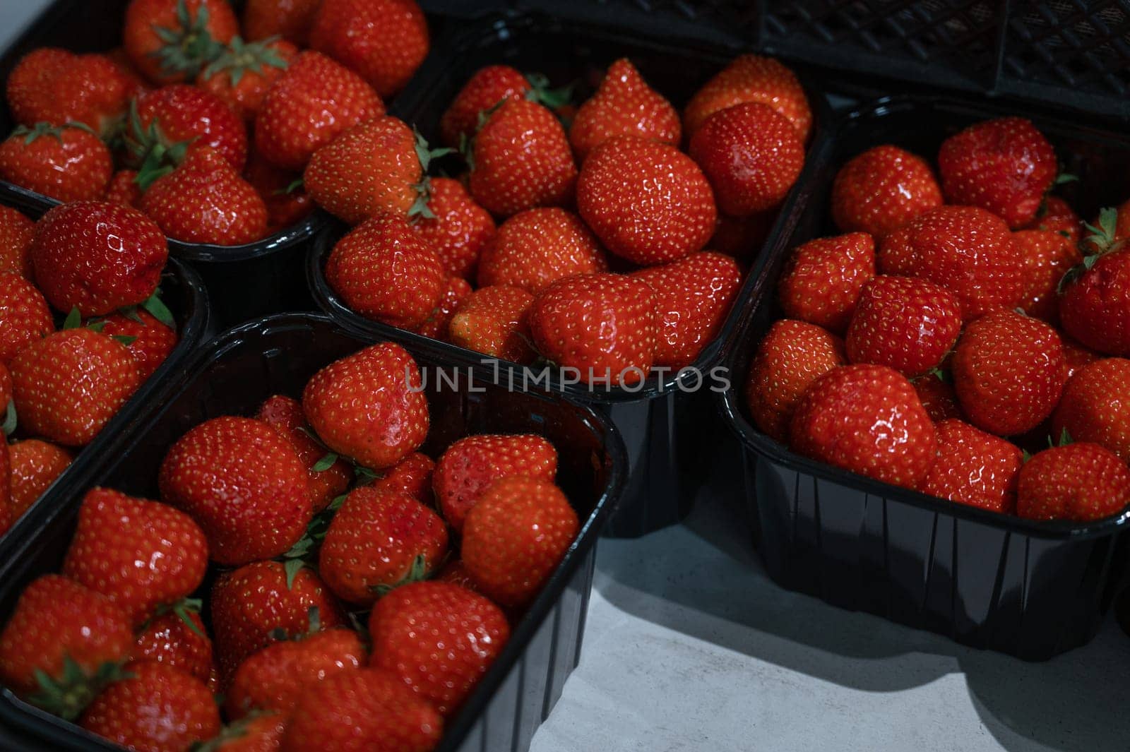 Assortment of fresh strawberry at market