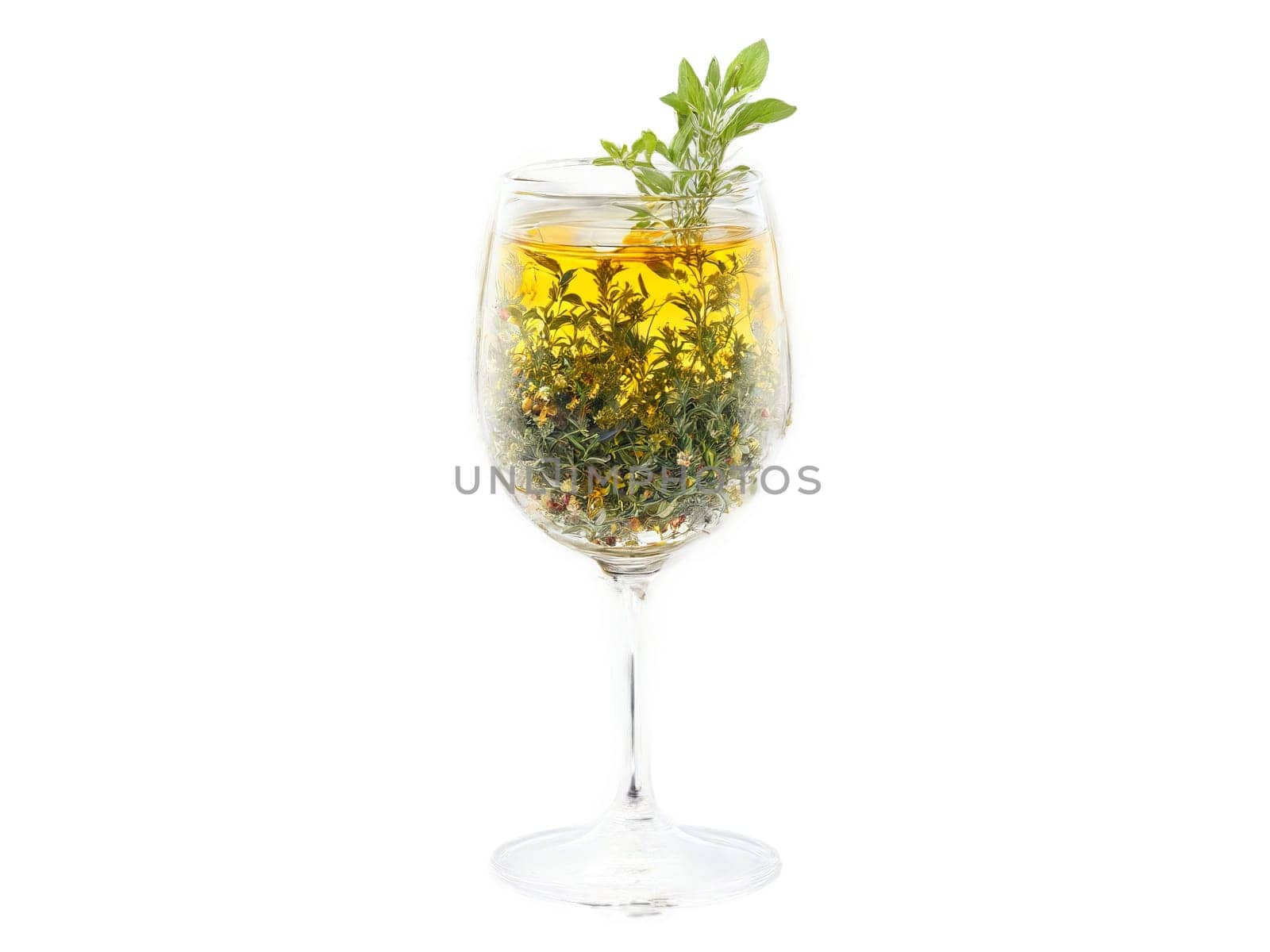 Herbal Tea A blend of herbal tea in a glass with various herbs and flowers. Drink isolated on transparent background.