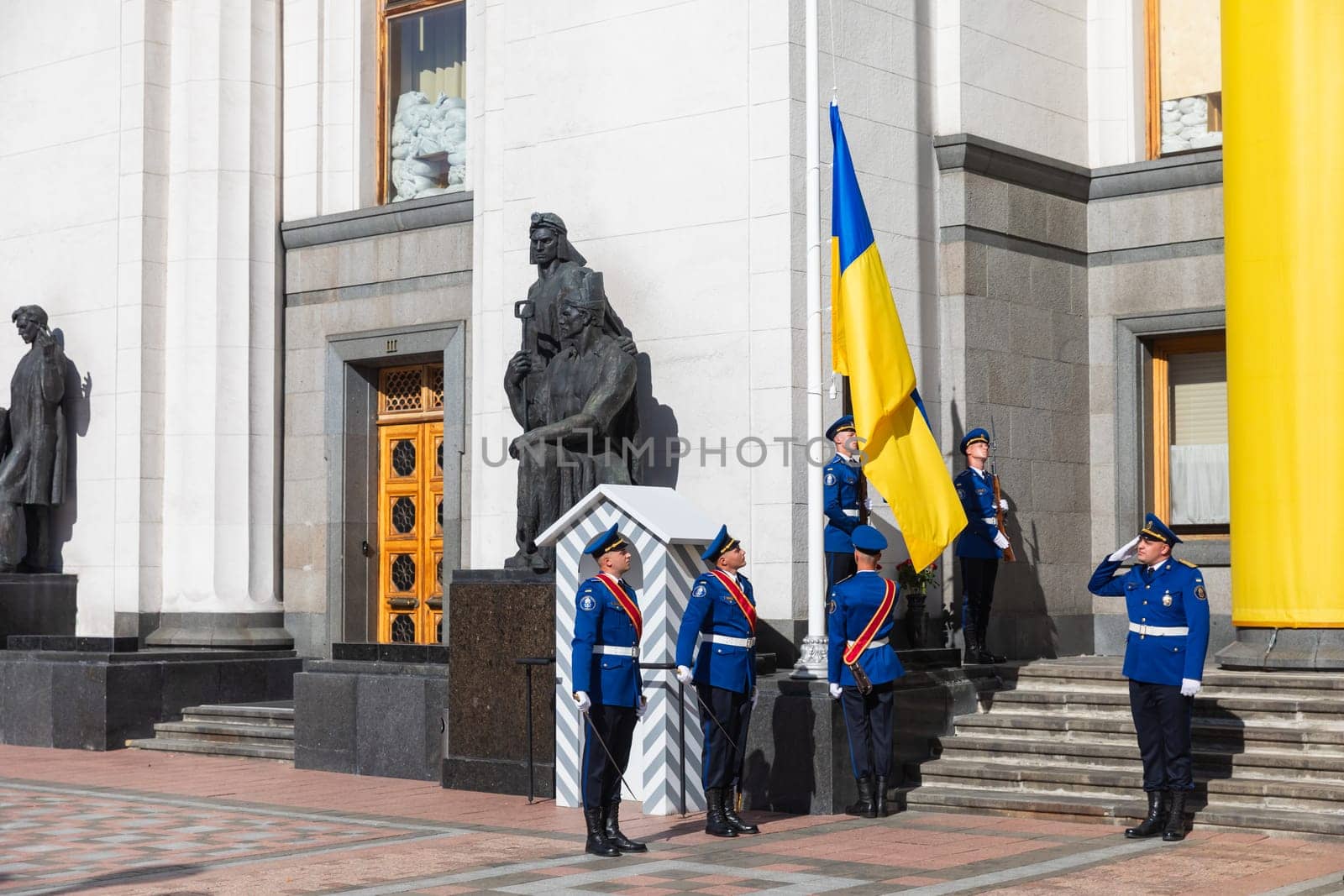 KYIV, UKRAINE - Aug. 23, 2024: A solemn ceremony near the Verkhovna Rada on State Flag Day. Guard of honour during the ceremonial raising of the national flag of Ukraine