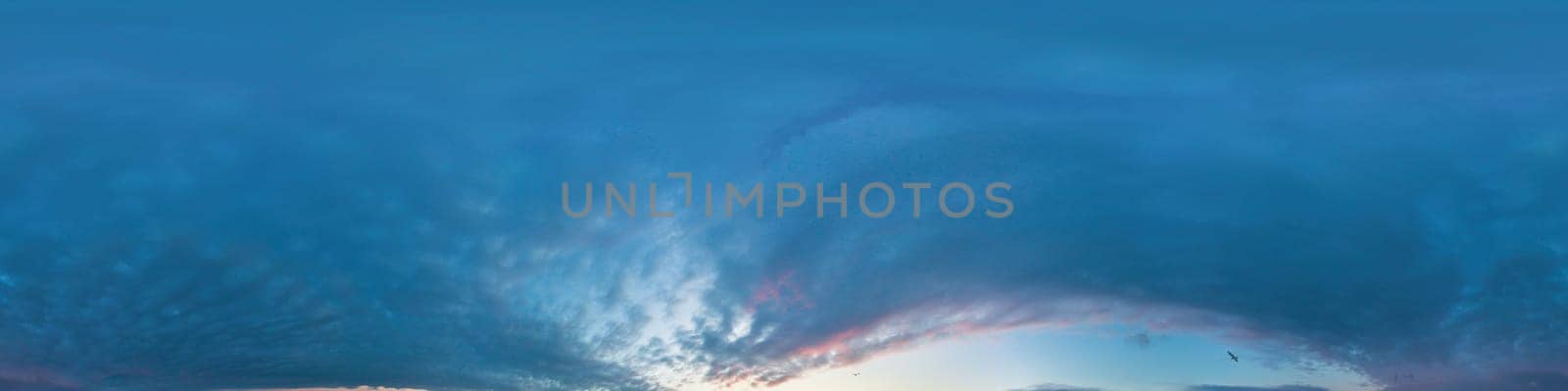 Bright sunset sky panorama with Cirrus clouds. Seamless hdr spherical equirectangular 360 panorama. Sky dome or zenith for 3D visualization, game and sky replacement for aerial drone 360 panoramas.