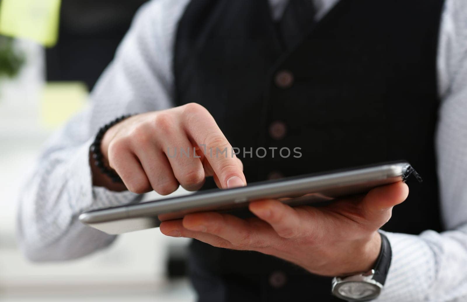 Male arm point finger using tablet pc display closeup. Stock market student management time chat addict electronic bank modern lifestyle job plan share blog tweet mania news web application