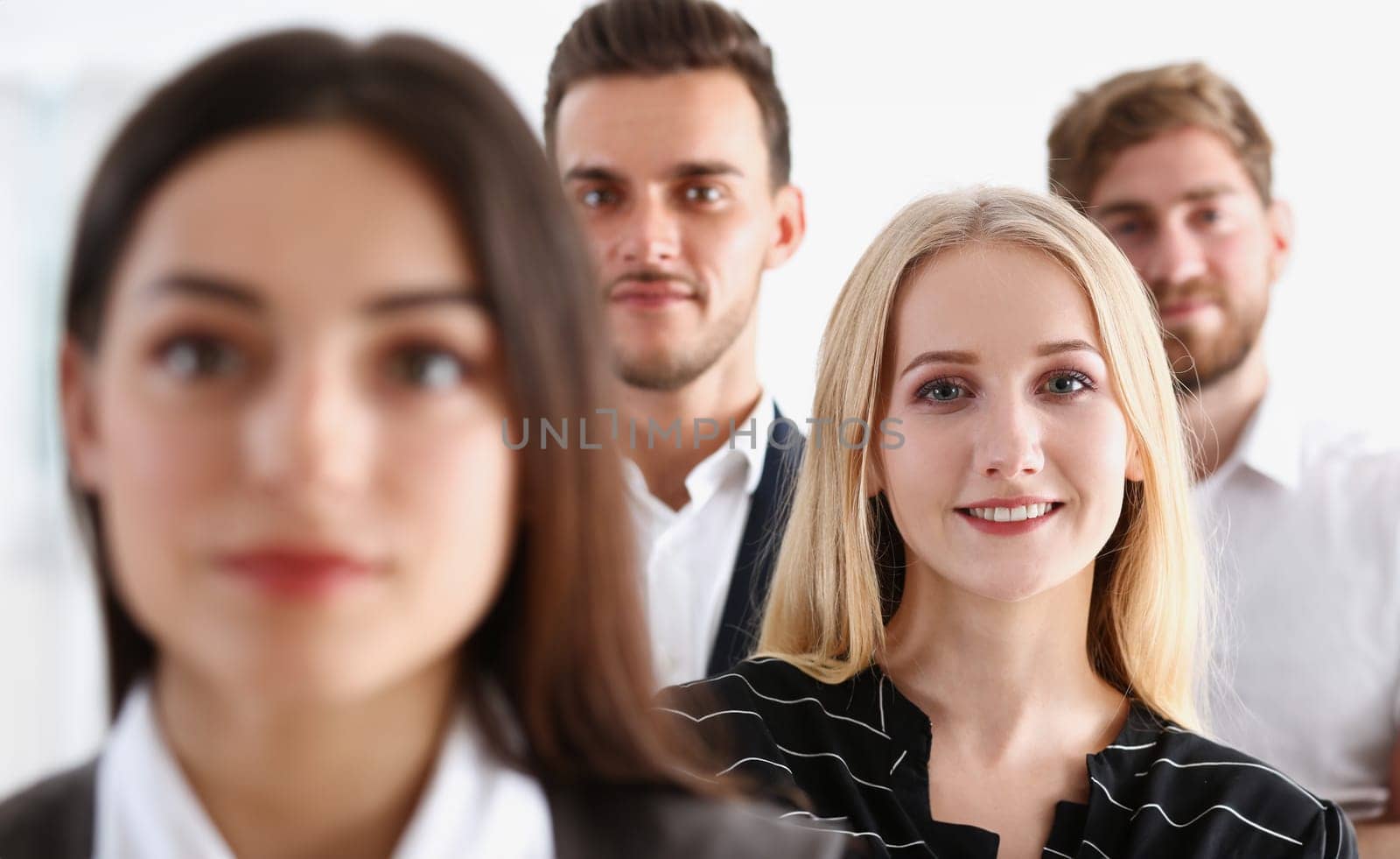 Group of smiling people stand in office looking in camera portrait. White collar power mediation solution project creative advisor participation profession train bank lawyer client visit concept