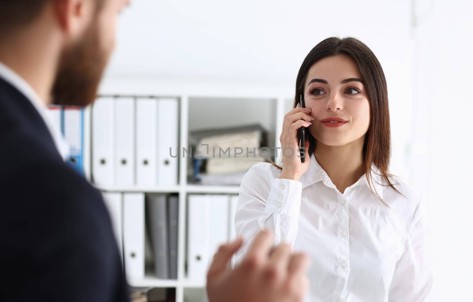 Beautiful brunette smiling businesswoman talk cellphone in office portrait. Stay in touch negotiate meeting job white collar busy life style electronic device store professional training concept