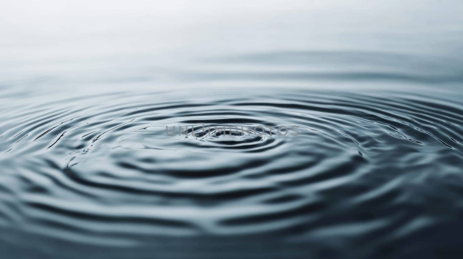 Rippled water surface, close-up view. Natural tranquility and serenity concept.