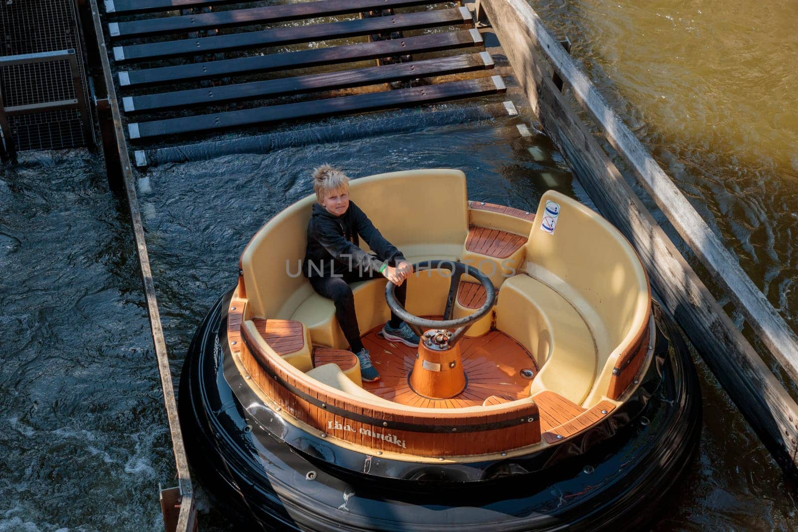 Helsinki, Finland - 19 AUGUST 2024: Water ride Hurjakuru in the amusement park Linnanmaki