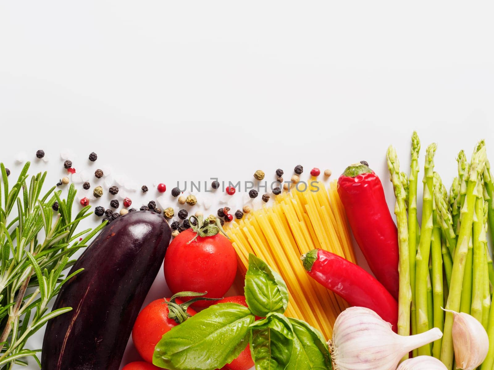 Italian kitchen and italian food concept. Ingredients for pasta isolated one edge. Copy space. Top view
